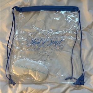Sabrina Carpenter, clear and blue Drawstring Bag and sleep mask.